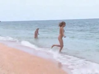 3 Nudists Playing On The Beach